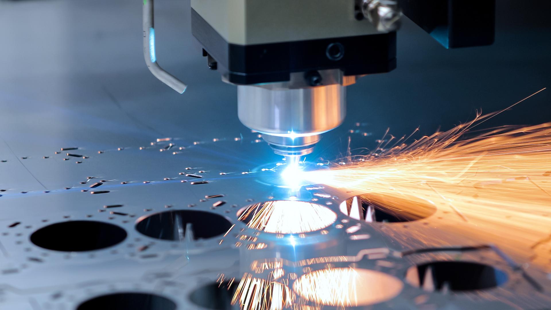Precision laser cutting of metal plate